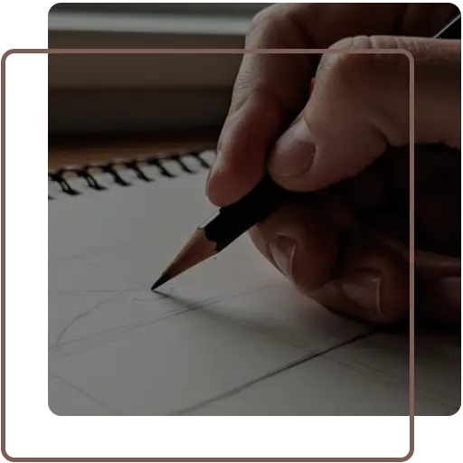 Mano con lápiz dibujando